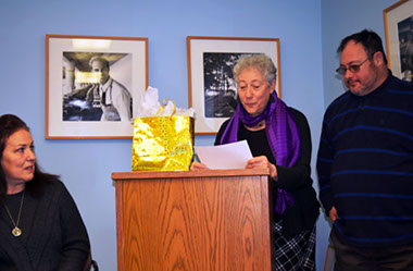 Muriel Horowitz (center) speaking about Michele Rodriguez (left) at 11-16 presentation of the 2017 Goldman Award. Her son Jon Horowitz is by her side to lend his support.